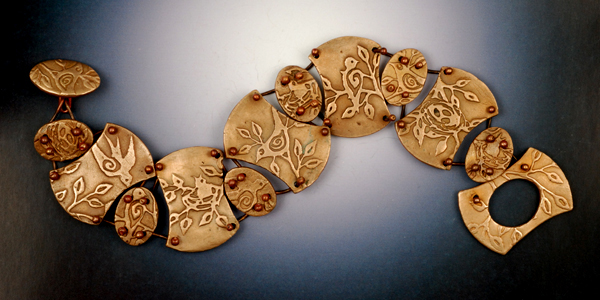 Vickie Hallmark | Flock bird bracelet, bronze metal clay, textures from original drawings